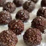 Quinoa Chocolate Crisps Recipe – Quick, Clean, Crunchy 9 mixing Quinoa Chocolate Crisps Recipe this puffed quinoa chocolate Recipe mixture in glass bowl